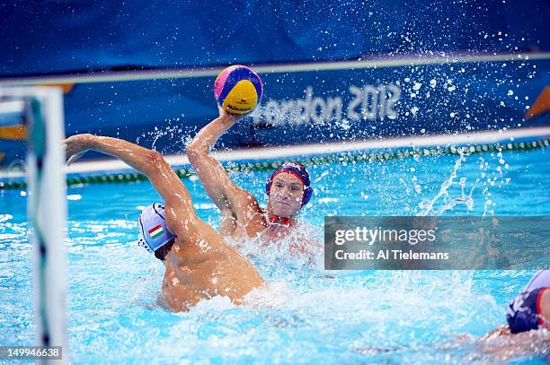 Summer Olympics: USA Jesse Smith in action vs Hungary Daniel Varga during Men's Preliminary Round - Group B game at Water Polo Arena. London, United...