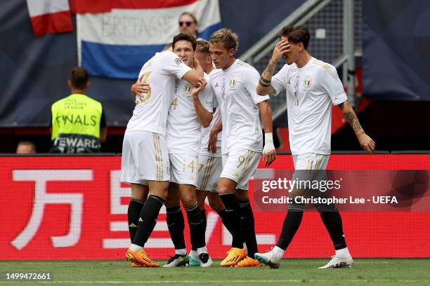 Federico Chiesa of Italy celebrates with teammates after scoring the team's third goal during the UEFA Nations League 2022/23 third-place match...