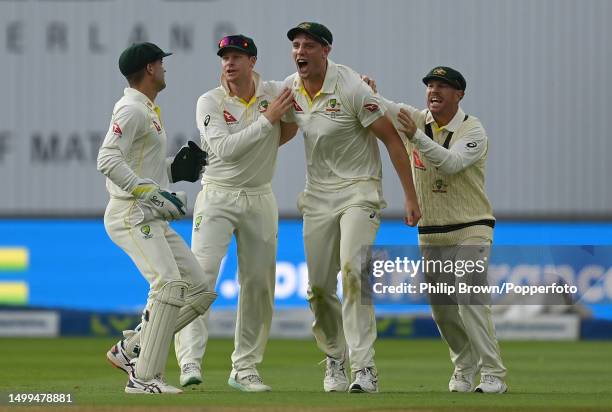 Cameron Green celebrates with Alex Carey , Steve Smith and David Warner of Australia after catching Ben Duckett of England during Day 3 of the LV=...