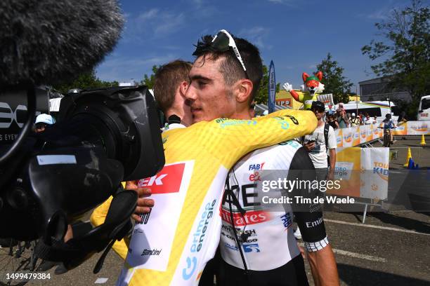 Overall race winner Mattias Skjelmose Jensen of Denmark and Team Trek-Segafredo - Yellow Leader Jersey and stage winner Juan Ayuso of Spain and UAE...