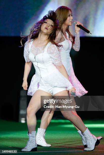 Min and Fei of South Korean girl group Miss A perform onstage during the Samsung Galaxy SIII Stadium "Idol Big Match" on August 7, 2012 in Seoul,...