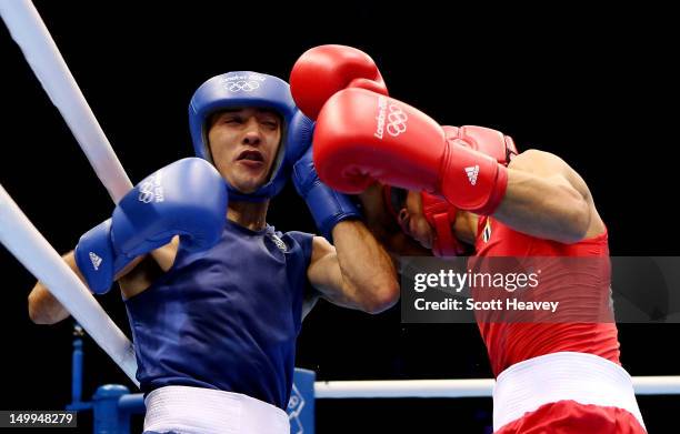 Robeisy Ramirez Carrazana of Cuba in action with Andrew Selby of Great Britain during the Men's Fly Boxing on Day 11 of the London 2012 Olympic Games...