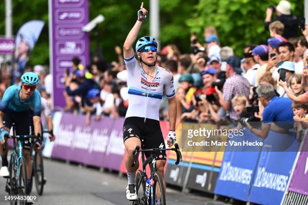 Fabio Jakobsen of The Netherlands and Team Soudal Quick-Step celebrates at finish line as stage winner and dedicates the victory to Gino Mäder of...