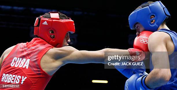 Robeisy Ramirez Carrazana Cuba fights with Andrew Selby of Great Britain during the Flyweight boxing quarterfinals of the 2012 London Olympic Games...