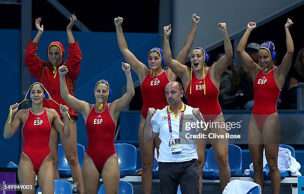 Spanish players celebrate winning the Women's Water Polo semifinal match between Spain and Hungary at the Water Polo Arena on August 7, 2012 in...