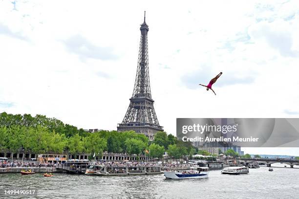 Anna Bader of Germany dives from the 21 meters platform in front of the Eiffel Tower during the Red Bull Cliff Diving Paris 2023 on June 16, 2023 in...