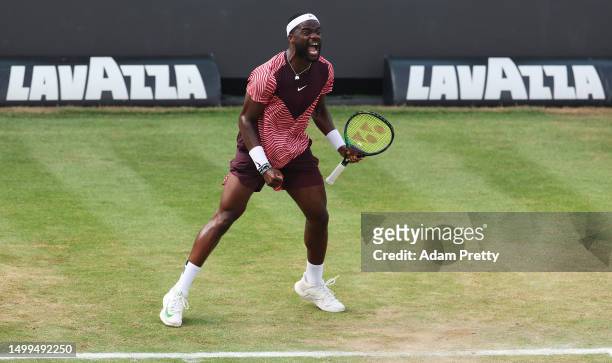 Frances Tiafoe of the United States celebrates winning match point over Jan-Lennard Struff of Germany hits during the mens final match on day nine of...