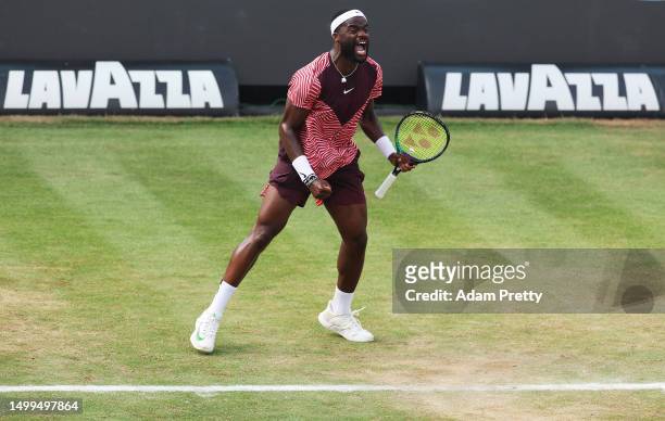 Frances Tiafoe of the United States celebrates winning match point over Jan-Lennard Struff of Germany during the mens final match on day nine of the...