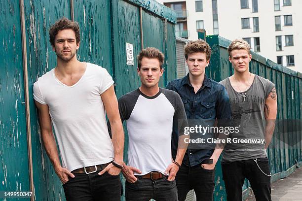 Lawson band members Andy Brown, Adam Pitts, Joel Peat and Ryan Fletcher pose during a Biz Session in Wapping on May 30, 2012 in London, England.