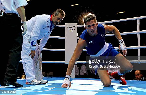 Alexis Vastine of France looks dejected after defeat to Taras Shelestyuk of Ukraine during the Men's Welter Boxing on Day 11 of the London 2012...