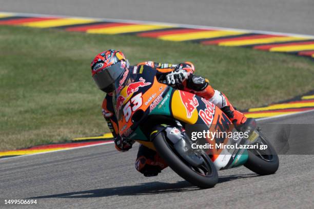 Deniz Oncu of Turkie and Red Bull KTM Ajo rounds the bend during the Moto3 race during the MotoGP of Germany - Race at Sachsenring Circuit on June...