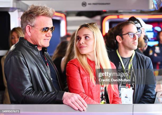 Gordon Ramsay and his daughter Holly Ramsay pose for a photo in the Red Bull Racing garage prior to the F1 Grand Prix of Canada at Circuit Gilles...