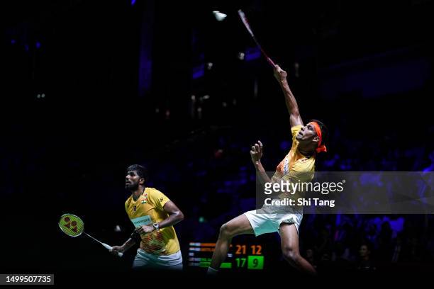 Satwiksairaj Rankireddy and Chirag Shetty of India compete in the Men's Double Final match against Aaron Chia and Soh Wooi Yik of Malaysia on day six...
