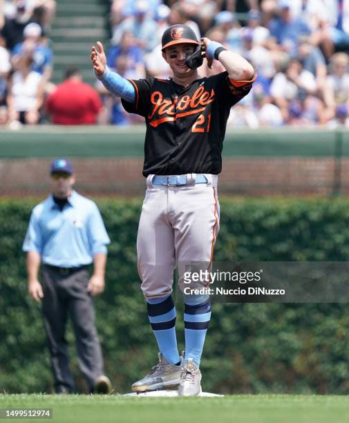 Austin Hays of the Baltimore Orioles reacts after a double during the first inning of a game against the Chicago Cubs at Wrigley Field on June 18,...