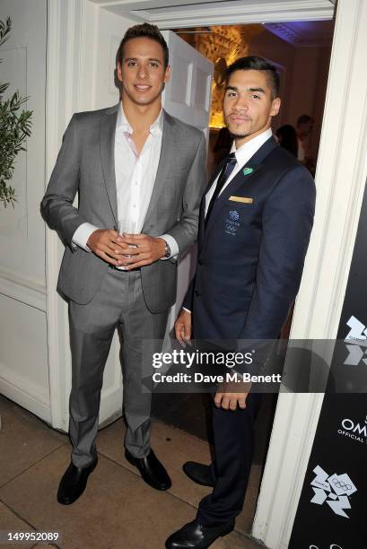 South African Olympic swimmer Chad le Clos and Great Britain Olympic gymnast Louis Smith attend 'Spotlight On Swimming' at OMEGA House, OMEGA's...