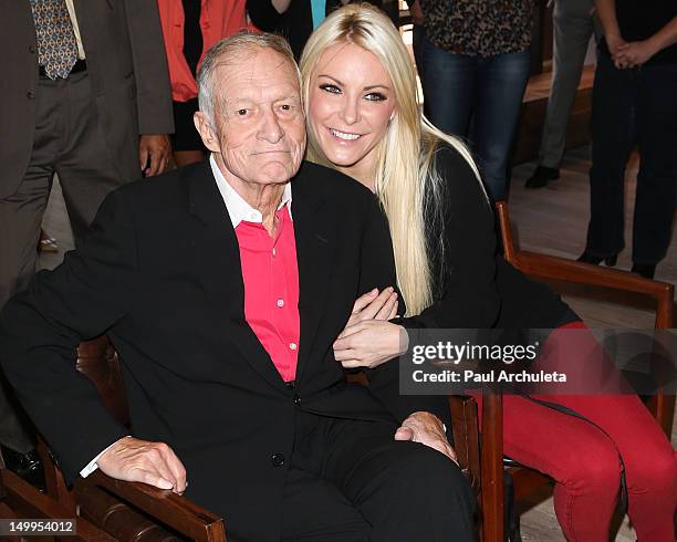 Playboy Founder Hugh Hefner and Playmate Crystal Harris attend The Beverly Hills City Council and Playboy Enterprises, Inc. Ribbon cutting ceremony...