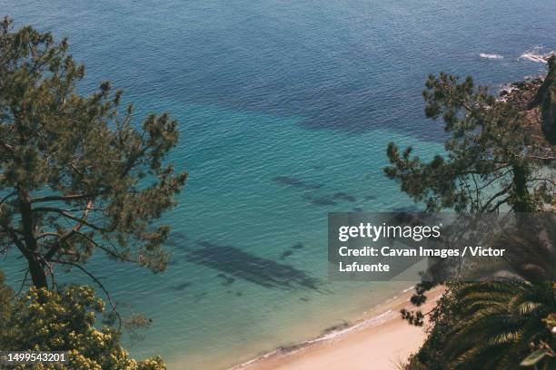 quiet cove located in the asturian coastal town of lastres - lastres stock pictures, royalty-free photos & images