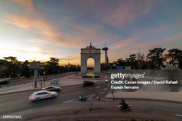 sunset in the arch of victory in madrid - afternoon stock pictures, royalty-free photos & images