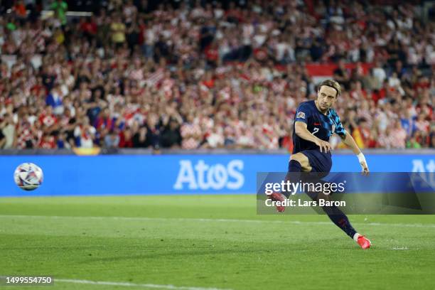 Unai Simon of Spain saves the fourth penalty from Lovro Majer of Croatia in the penalty shoot out during the UEFA Nations League 2022/23 final match...