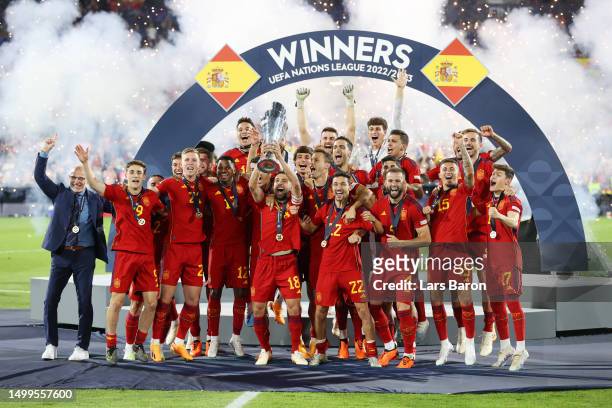 Jordi Alba of Spain lifts the UEFA Nations League trophy after the team's victory in the UEFA Nations League 2022/23 final match between Croatia and...