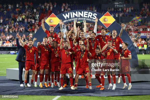Jordi Alba of Spain lifts the UEFA Nations League trophy after the team's victory in the UEFA Nations League 2022/23 final match between Croatia and...