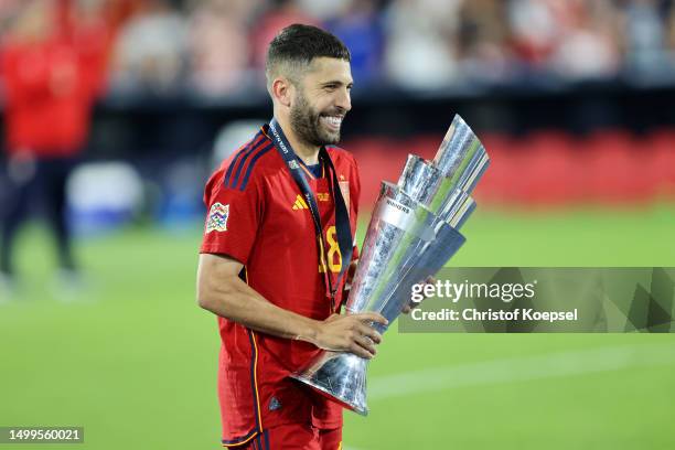 Jordi Alba of Spain poses for a photograph with the UEFA Nations League trophy after the team's victory in the UEFA Nations League 2022/23 final...