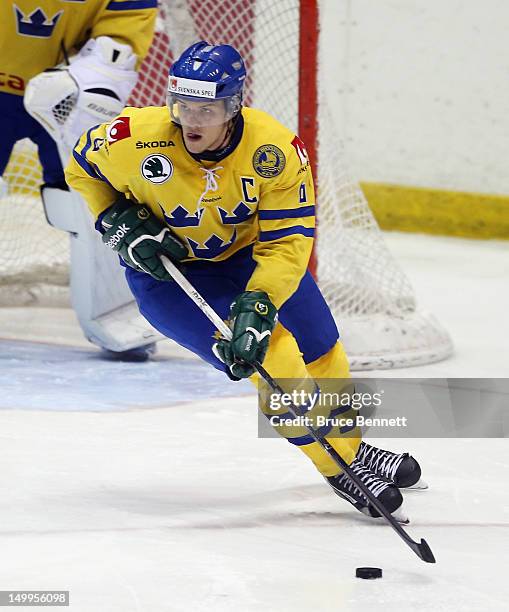 Oscar Klefbom of Team Sweden skates against Team Finland at the USA hockey junior evaluation camp at the Lake Placid Olympic Center on August 7, 2012...