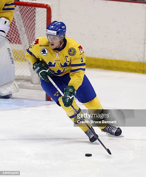 Oscar Klefbom of Team Sweden skates against Team Finland at the USA hockey junior evaluation camp at the Lake Placid Olympic Center on August 7, 2012...