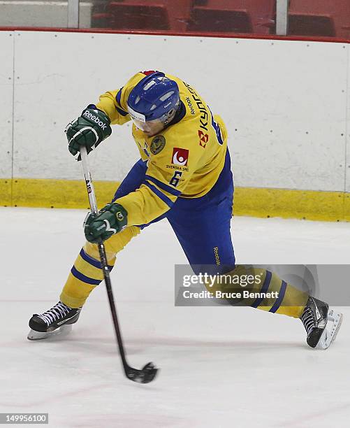 Oscar Klefbom of Team Sweden skates against Team Finland at the USA hockey junior evaluation camp at the Lake Placid Olympic Center on August 7, 2012...