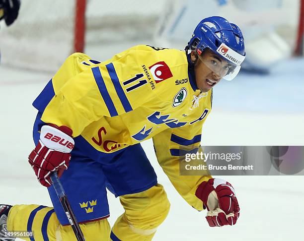 Jeremy Boyce Rotevall of Team Sweden skates against Team Finland at the USA hockey junior evaluation camp at the Lake Placid Olympic Center on August...