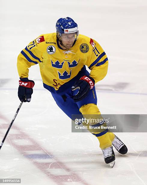 Joachim Nermark of Team Sweden skates against Team Finland at the USA hockey junior evaluation camp at the Lake Placid Olympic Center on August 7,...