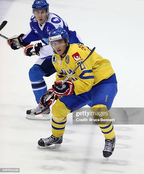 Victor Rask of Team Sweden skates against Team Finland at the USA hockey junior evaluation camp at the Lake Placid Olympic Center on August 7, 2012...