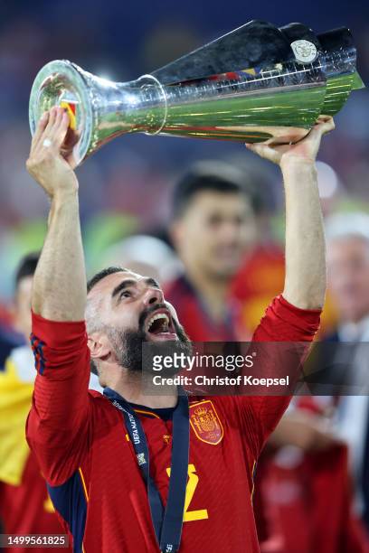 Dani Carvajal of Spain celebrates with the UEFA Nations League trophy after the team's victory in the UEFA Nations League 2022/23 final match between...