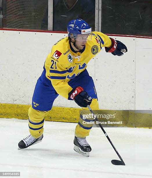 Joachim Nermark of Team Sweden skates against Team Finland at the USA hockey junior evaluation camp at the Lake Placid Olympic Center on August 7,...