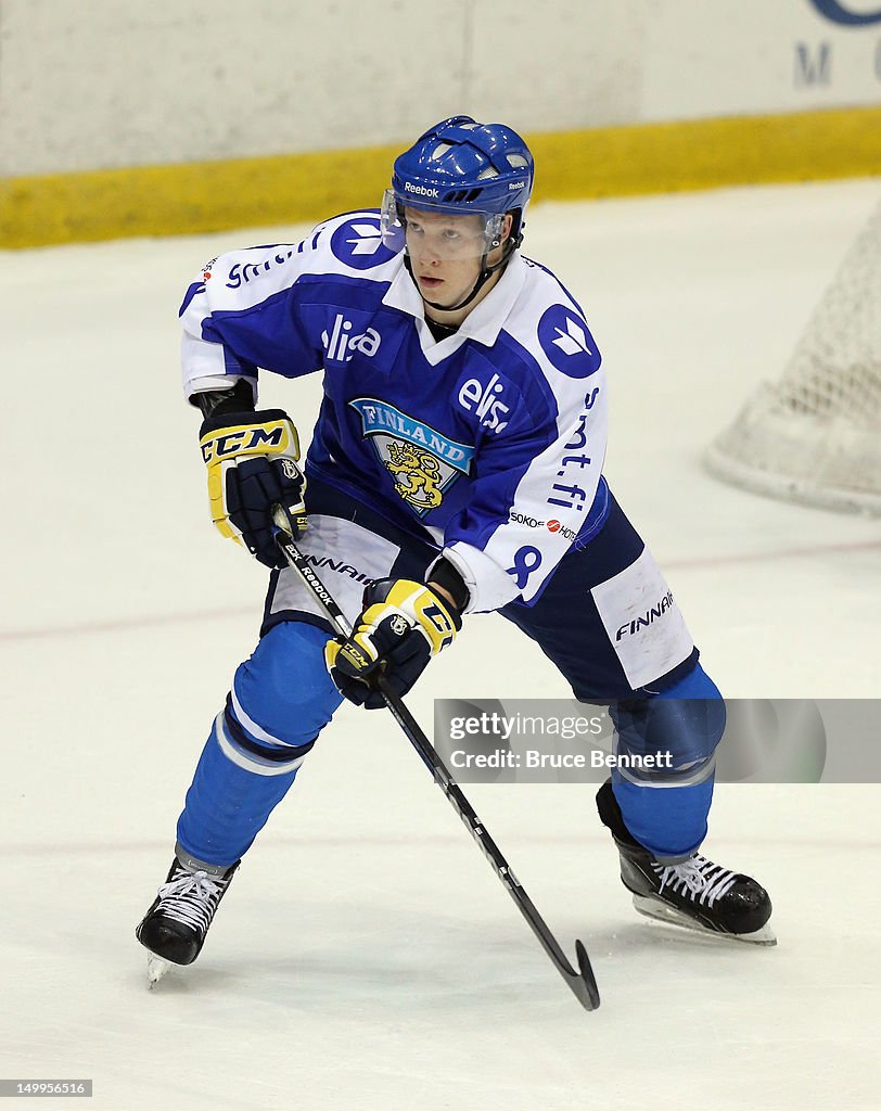 Joonas Valkonen Of Team Finland Skates Against Team Sweden At The USA joonas-valkonen-of-team-finland-skates-against-team-sweden-at-the-usa