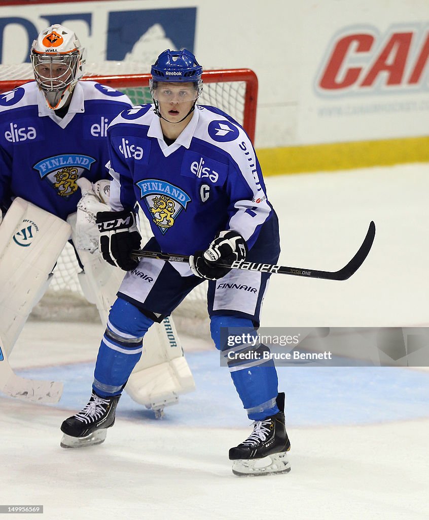 Olli Maata Of Team Finland Skates Against Team Sweden At The USA olli-maata-of-team-finland-skates-against-team-sweden-at-the-usa