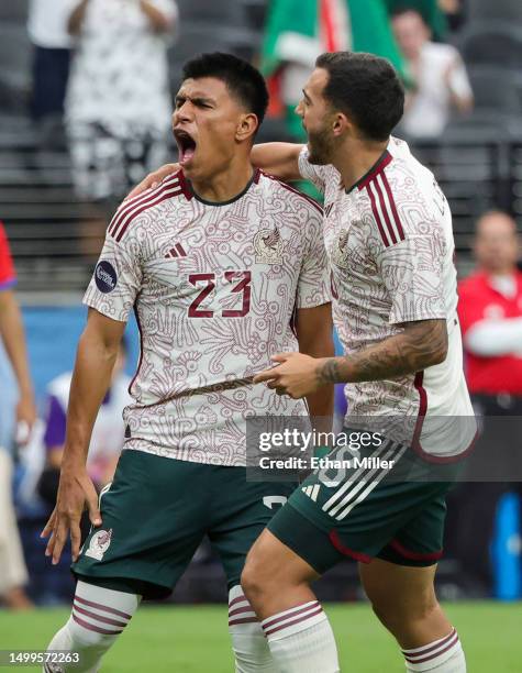 Jesus Gallardo and Luis Chávez of Mexico celebrate a goal by Gallardo against Panama in the first half of the 2023 CONCACAF Nations League...