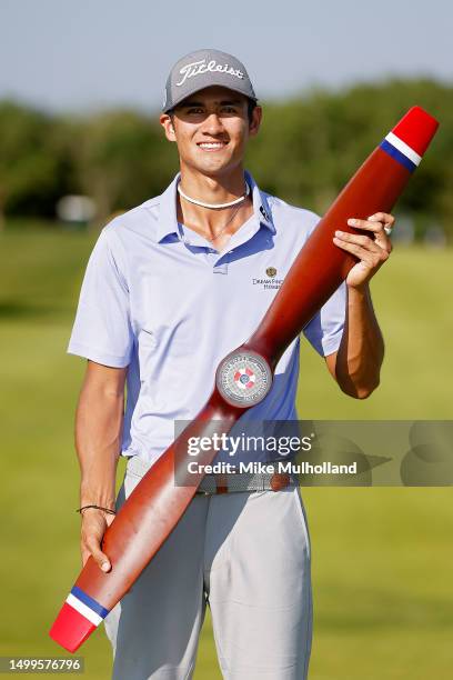 Ricky Castillo of the United States celebrates with the trophy after winning the Blue Cross and Blue Shield of Kansas Wichita Open at Crestview...