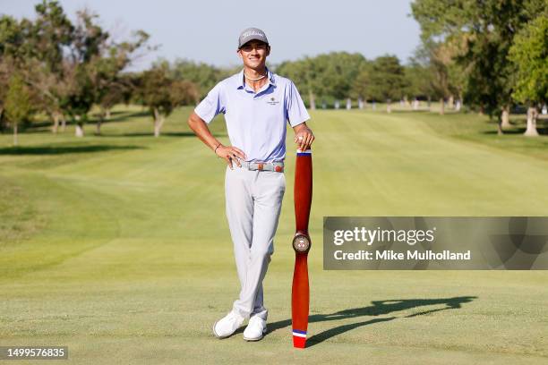 Ricky Castillo of the United States celebrates with the trophy after winning the Blue Cross and Blue Shield of Kansas Wichita Open at Crestview...