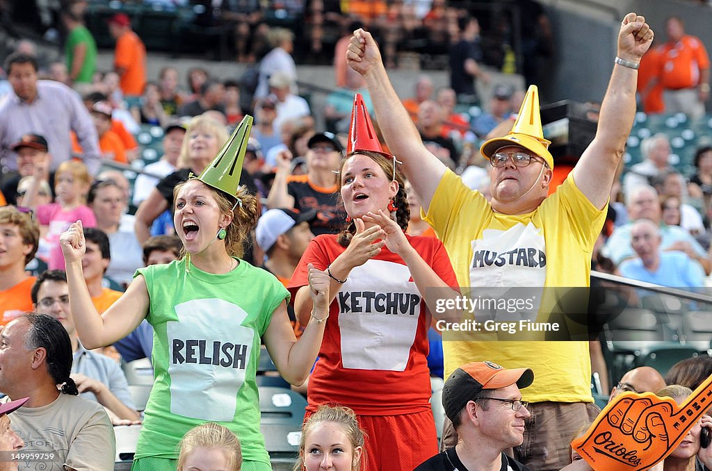 Susan Handley, Kaity Handley and John Handley cheer during the video  News Photo - Getty Images