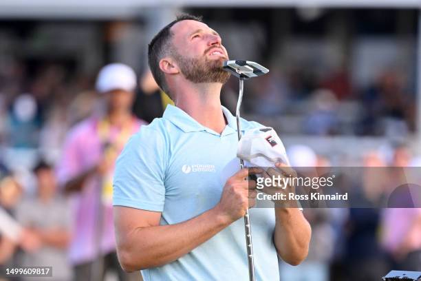 Wyndham Clark of the United States reacts to his winning putt on the 18th green during the final round of the 123rd U.S. Open Championship at The Los...