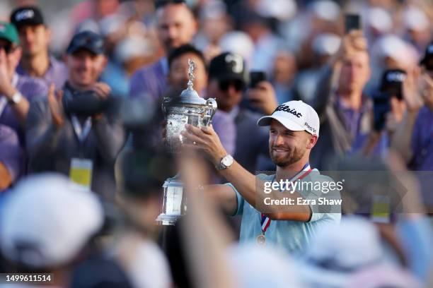 Wyndham Clark of the United States poses with the trophy after winning during the final round of the 123rd U.S. Open Championship at The Los Angeles...