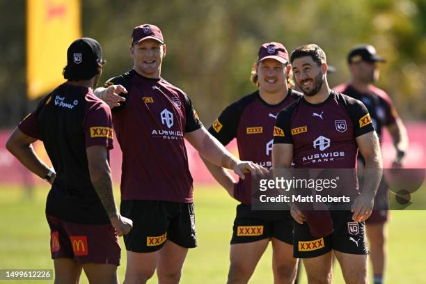 Ben Hunt shares a laugh Johnathan Thurston during a Queensland Maroons State of Origin training session at Sanctuary Cove on June 19, 2023 in Gold...
