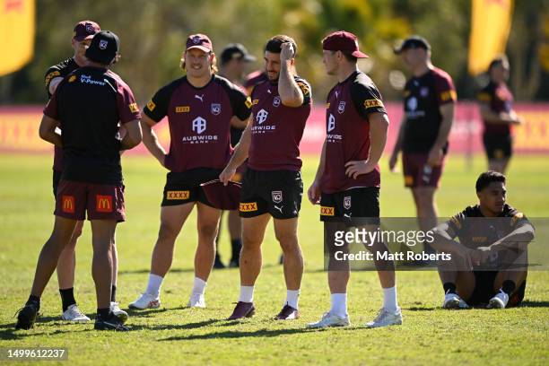 Ben Hunt shares a laugh Johnathan Thurston during a Queensland Maroons State of Origin training session at Sanctuary Cove on June 19, 2023 in Gold...