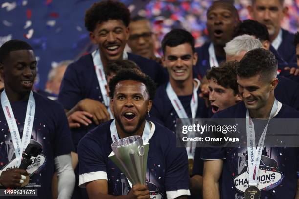 Weston McKennie takes the trophy after winning the CONCACAF Nations League Championship Final between United States and Canada at Allegiant Stadium...