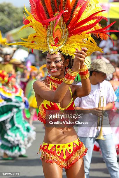 Dancer takes part in the traditional 55th Desfile de Silleteros during the Feria De Flores 2012 at Guayaquil Bridge on August 7, 2012 in Medellin,...