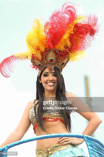 Dancer woman takes part in the traditional 55th Desfile de Silleteros during the Feria De Flores 2012 at Guayaquil Bridge on August 7, 2012 in...