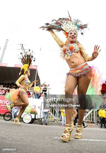 Dancer woman takes part in the traditional 55th Desfile de Silleteros during the Feria De Flores 2012 at Guayaquil Bridge on August 7, 2012 in...