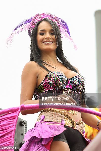 Dancer woman takes part in the traditional 55th Desfile de Silleteros during the Feria De Flores 2012 at Guayaquil Bridge on August 7, 2012 in...