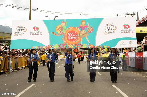 Walking performers attend the traditional 55th Desfile de Silleteros during the Feria De Flores 2012 at Guayaquil Bridge on August 7, 2012 in...